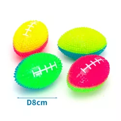 Świecąca piłka do rugby 8cm gryzak z wypustkami do czyszczenia zębów - 8719138051083